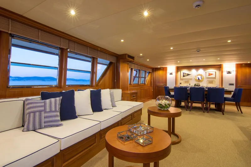 Parvati Yacht Photos Pics Luxurious 1979 CRN Displacement yacht interior with elegant seating and dining area.