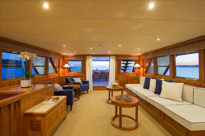 Parvati Yacht Photos Pics Luxurious 1979 CRN Displacement yacht interior with elegant seating and ocean view.