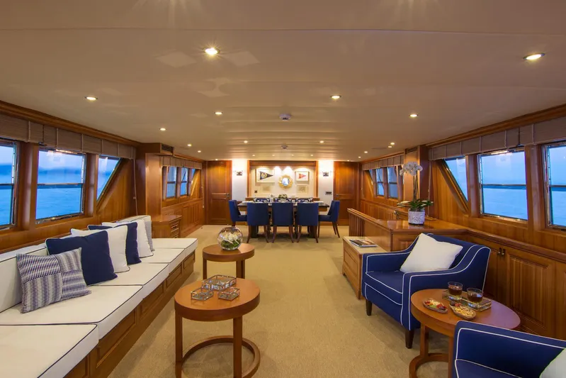 Parvati Yacht Photos Pics Luxurious 1979 CRN Displacement yacht interior with elegant seating and dining area.