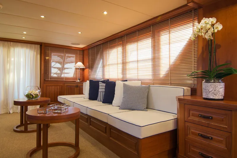 Parvati Yacht Photos Pics Luxurious 1979 CRN Displacement yacht interior with elegant wood paneling and plush seating.