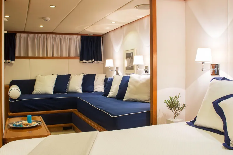 Parvati Yacht Photos Pics Luxurious 1979 CRN Displacement yacht interior with cozy seating and elegant decor.