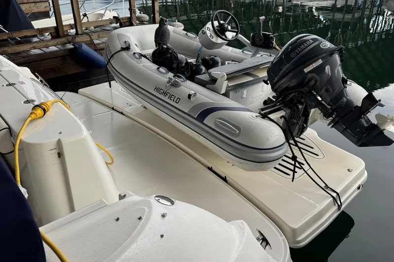 Covetime II Yacht Photos Pics 2006 Sea Ray 44 Sedan Bridge with Highfield inflatable boat and Yamaha motor at dock.