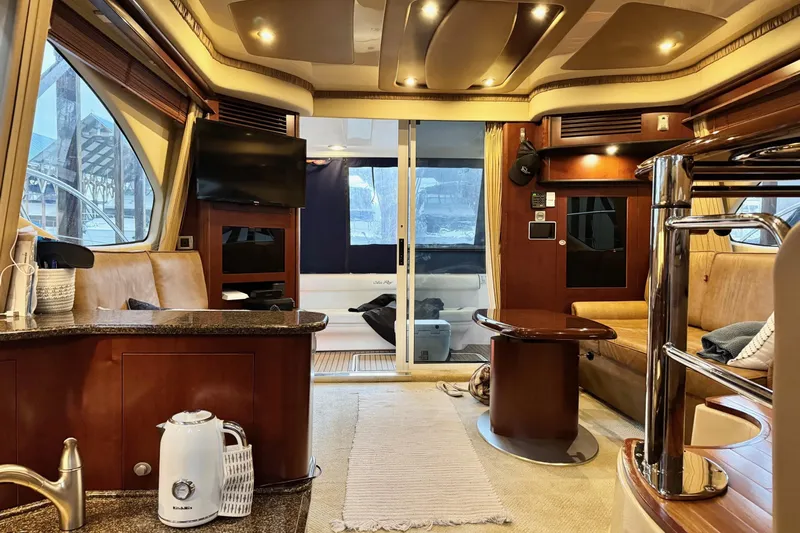 Covetime II Yacht Photos Pics Luxurious interior of a 2006 Sea Ray 44 Sedan Bridge yacht with modern amenities.