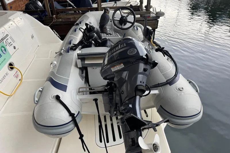 Covetime II Yacht Photos Pics Inflatable boat with Yamaha motor on 2006 Sea Ray 44 Sedan Bridge yacht.