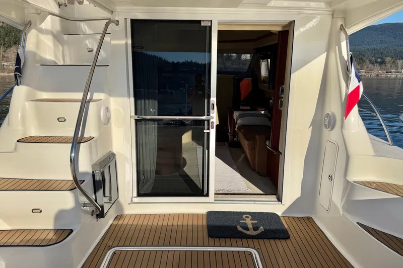 Covetime II Yacht Photos Pics 2006 Sea Ray 44 Sedan Bridge yacht with teak deck and sliding glass door.