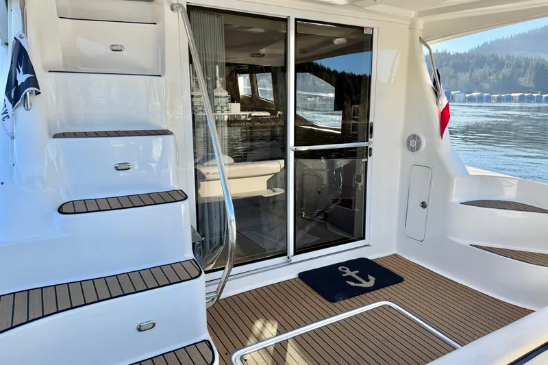 Covetime II Yacht Photos Pics 2006 Sea Ray 44 Sedan Bridge yacht with teak steps and sliding glass door.