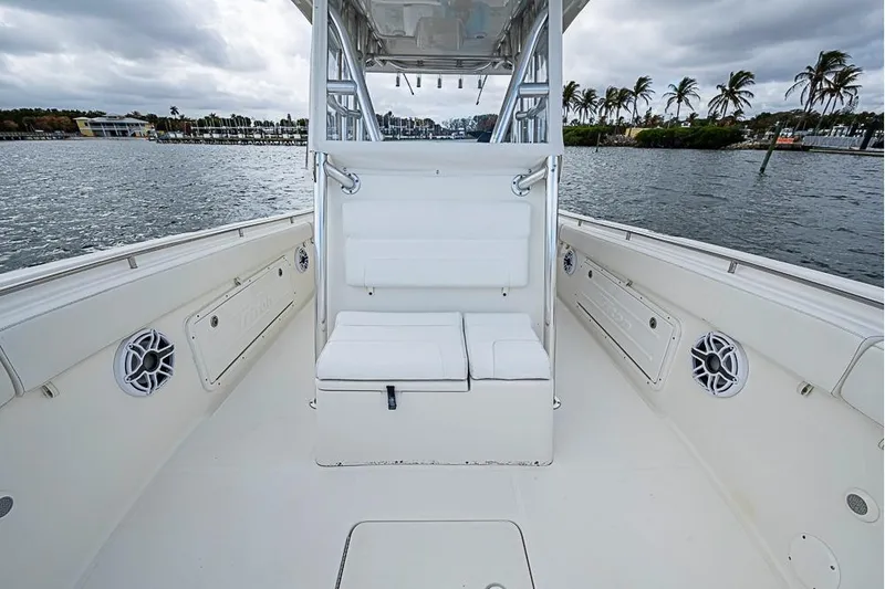  Yacht Photos Pics 2007 Triton 351 CC boat interior with seating, speakers, and ocean view.