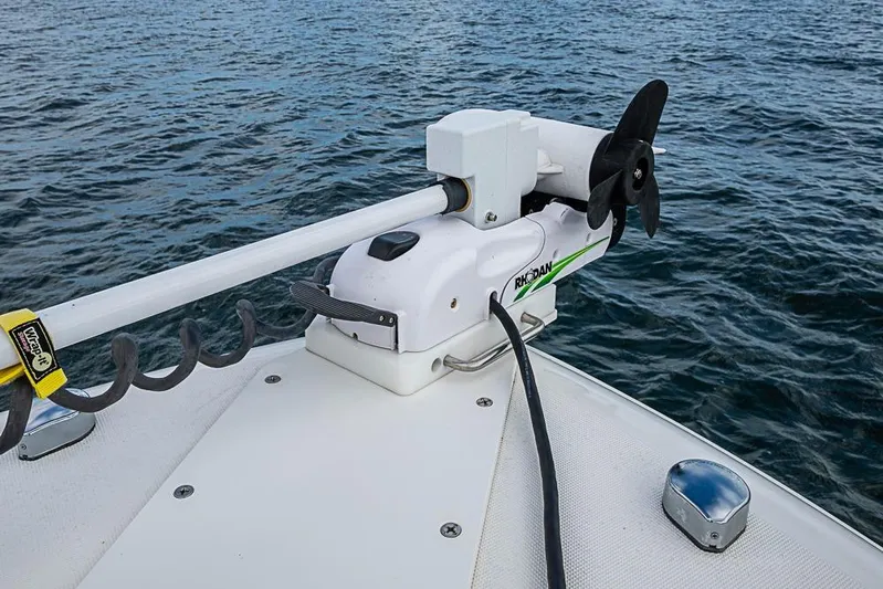  Yacht Photos Pics Triton 351 CC 2007 boat with Rhodan trolling motor on open water.