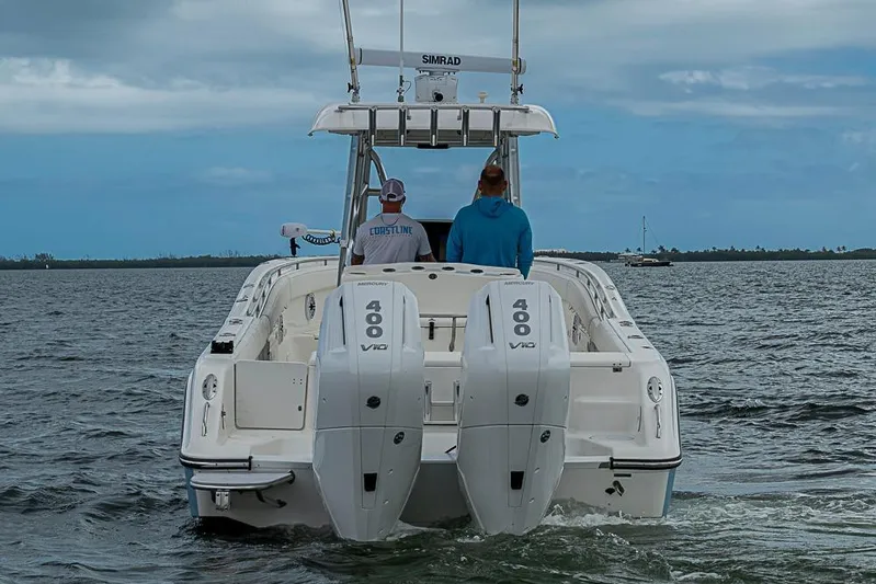  Yacht Photos Pics 2007 Triton 351 CC boat with dual 400 V10 engines on open water.