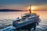Luxurious 2024 Custom K584 Hull 2 yacht cruising at sunset on serene waters.