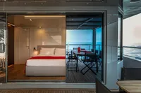 Luxurious yacht bedroom and deck, Custom K584 Hull 2, 2024 model, ocean view.
