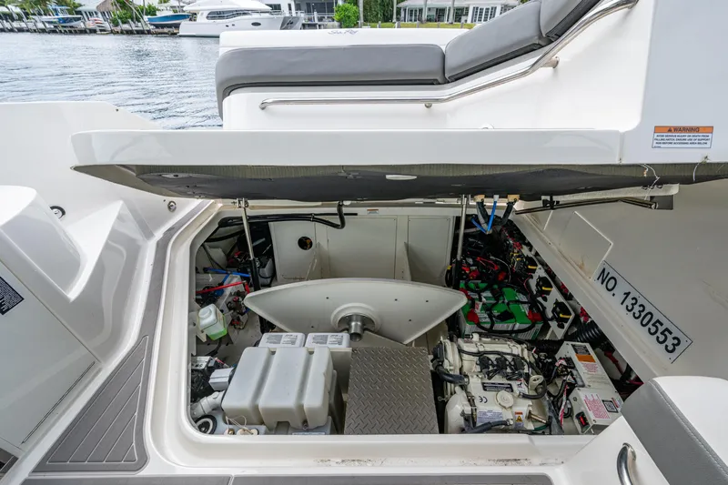  Yacht Photos Pics 2023 Sea Ray Sundancer 320 Outboard engine compartment, showcasing detailed mechanical components.