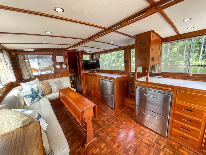 Tallulah Yacht Photos Pics Interior of 1989 Grand Banks 42 Classic yacht with wood finish and modern amenities.