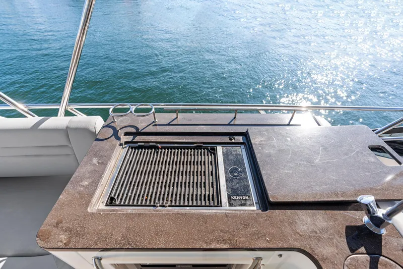 Guilty Pleasure Yacht Photos Pics Outdoor grill on 2014 Sea Ray 510 Fly yacht with ocean view.