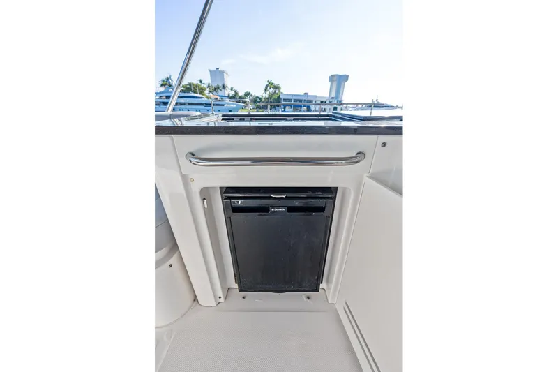 Guilty Pleasure Yacht Photos Pics 2014 Sea Ray 510 Fly yacht interior with built-in mini fridge.