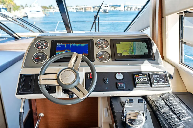 Guilty Pleasure Yacht Photos Pics Cockpit of 2014 Sea Ray 510 Fly yacht with advanced navigation systems and controls.