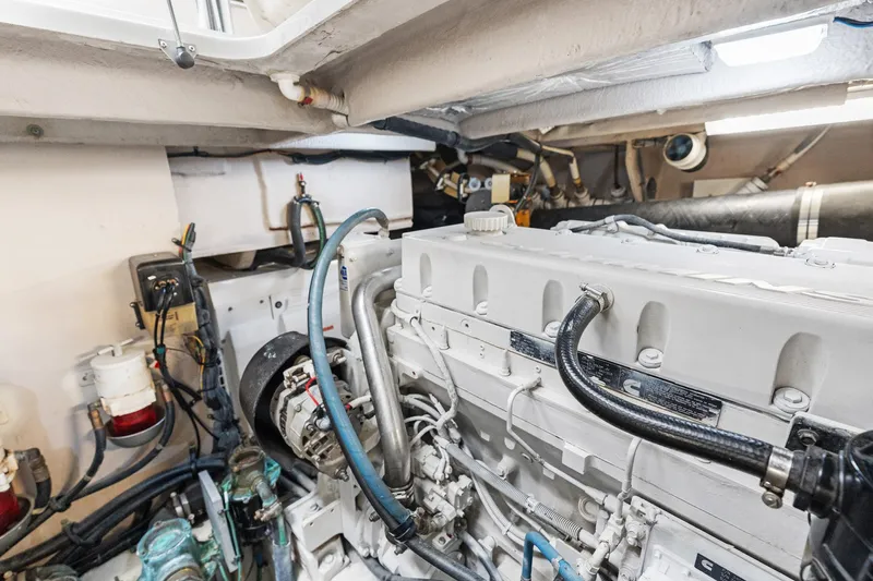 Guilty Pleasure Yacht Photos Pics Engine room of 2014 Sea Ray 510 Fly yacht, showcasing mechanical components and wiring.