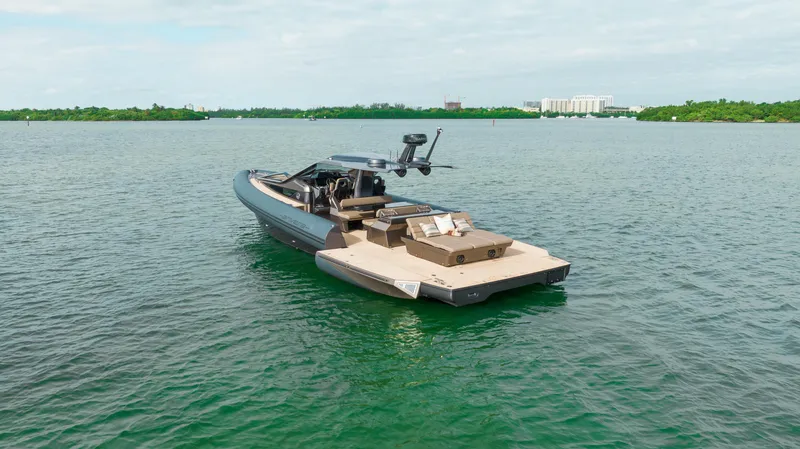 Anvera 48 Yacht Photos Pics Luxury Anvera 48 yacht on serene water, 2025 model, showcasing sleek design and spacious deck.