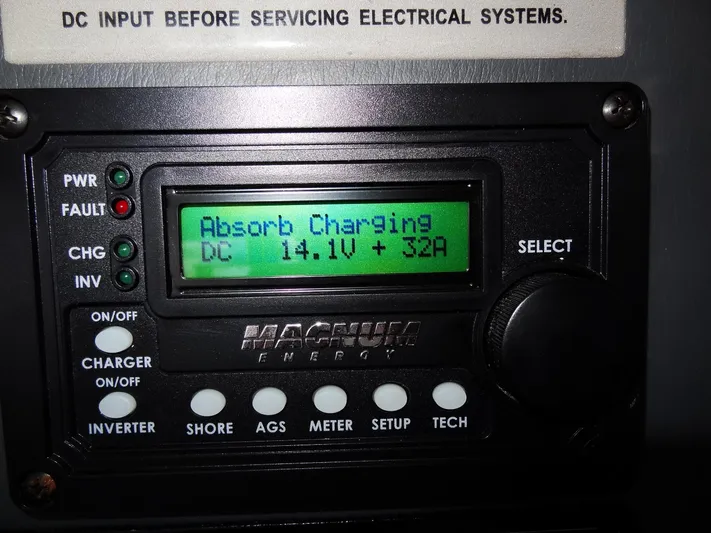 Good Times Yacht Photos Pics Control panel displaying "Absorb Charging" at 14.1V and 32A on a Leopard 45, 2020 model.