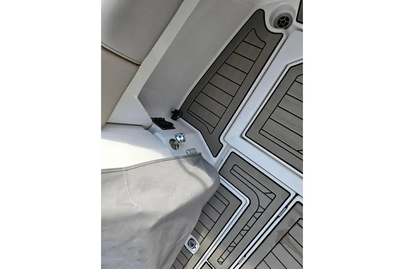 Frisky Yacht Photos Pics Interior view of 2022 Cuwater C-32-CB boat with sleek flooring design.