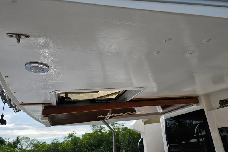 Frisky Yacht Photos Pics 2022 Cuwater C-32-CB boat interior ceiling with hatch and lighting.