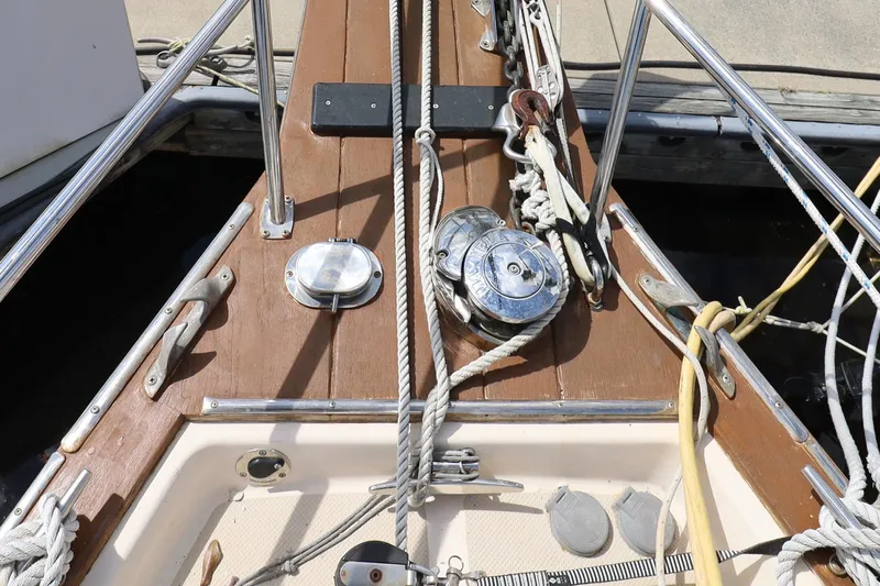 Migaloo Yacht Photos Pics Bow of 1996 Island Packet 40 sailboat with ropes and winches.