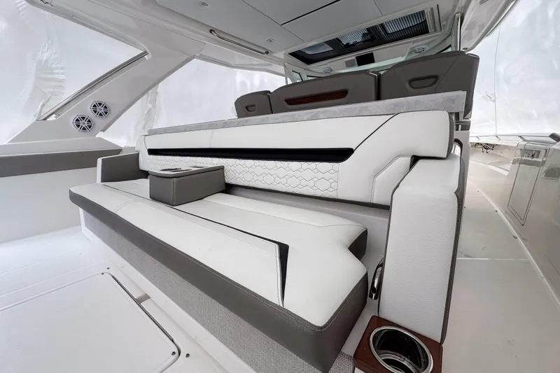  Yacht Photos Pics Luxurious seating area on a 2022 Tiara Yachts 43 LS, featuring modern design and comfort.