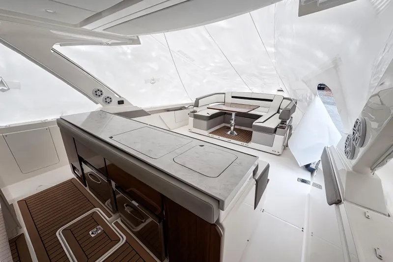  Yacht Photos Pics Luxurious interior of 2022 Tiara Yachts 43 LS with elegant seating and modern design.