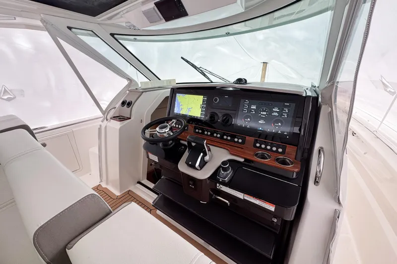  Yacht Photos Pics 2022 Tiara Yachts 43 LS helm with advanced navigation and control systems.