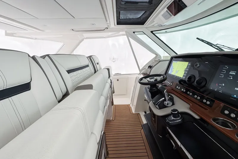  Yacht Photos Pics Luxurious interior of 2022 Tiara Yachts 43 LS with advanced navigation system.