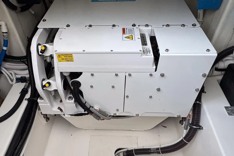  Yacht Photos Pics Engine compartment of 2022 Tiara Yachts 43 LS, featuring electrical components and wiring.