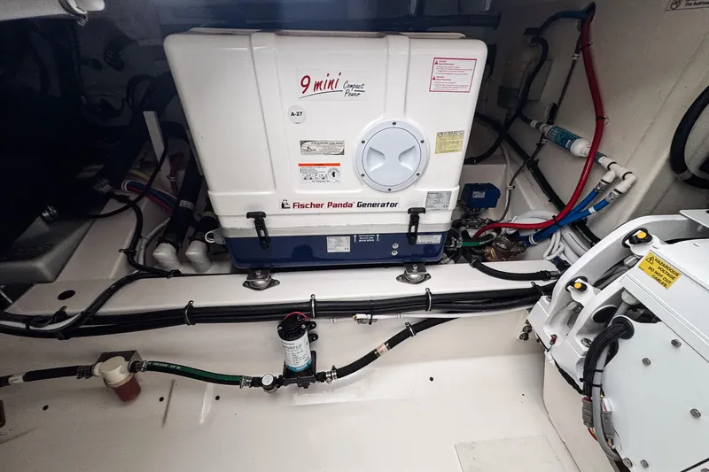  Yacht Photos Pics Engine room of 2022 Tiara Yachts 43 LS with Fischer Panda generator.