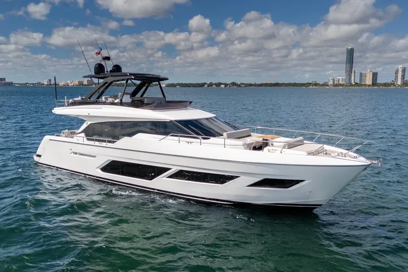 Santa Maria Yacht Photos Pics 2024 Ferretti Yachts 720 cruising on a sunny day with city skyline backdrop.