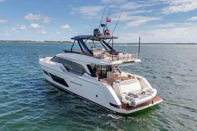 Santa Maria Yacht Photos Pics 2024 Ferretti Yachts 720 cruising on open water under a clear blue sky.