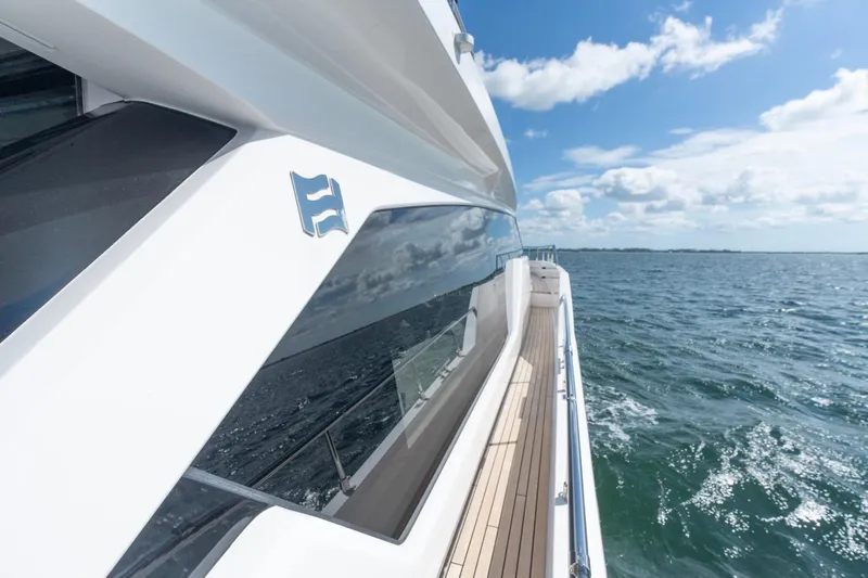 Santa Maria Yacht Photos Pics 2024 Ferretti Yachts 720 cruising on open water under a clear blue sky.