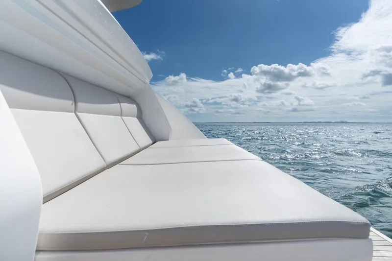 Santa Maria Yacht Photos Pics Luxurious seating on 2024 Ferretti Yachts 720 with ocean view under blue sky.