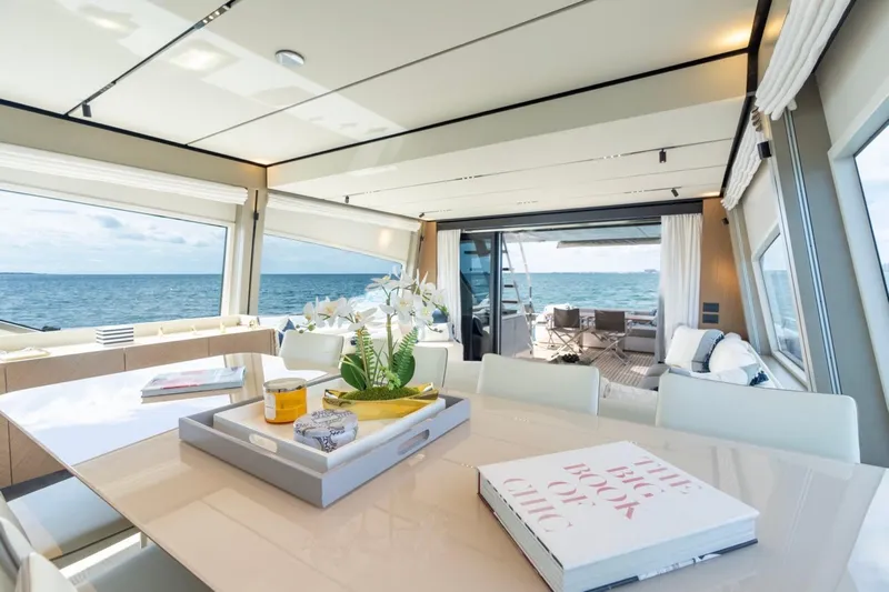 Santa Maria Yacht Photos Pics Luxurious interior of 2024 Ferretti Yachts 720 with ocean view and elegant decor.