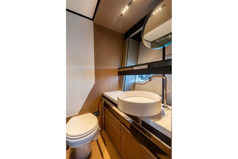 Santa Maria Yacht Photos Pics Luxurious bathroom interior of 2024 Ferretti Yachts 720, featuring modern fixtures and elegant design.