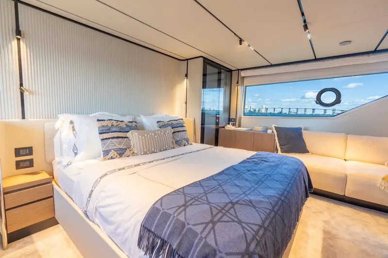 Santa Maria Yacht Photos Pics Luxurious bedroom interior of 2024 Ferretti Yachts 720 with ocean view.