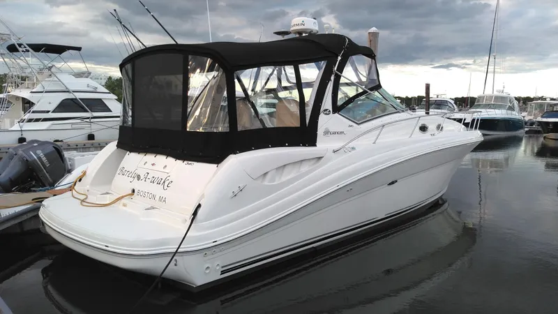 Barely "a" Wake Yacht Photos Pics 2004 Sea Ray 340 Sundancer yacht docked at marina.