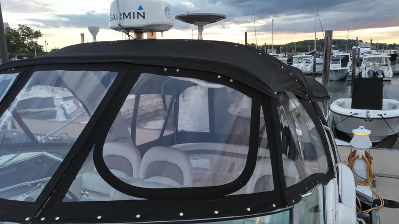 Barely "a" Wake Yacht Photos Pics 2004 Sea Ray 340 Sundancer docked at a marina with Garmin radar.