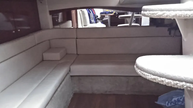 Barely "a" Wake Yacht Photos Pics Interior seating area of 2004 Sea Ray 340 Sundancer yacht.