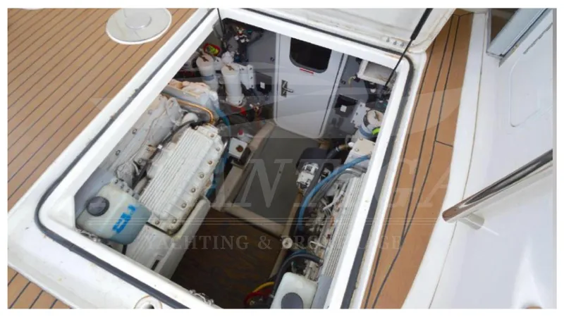  Yacht Photos Pics Engine compartment of a 2010 Meridian 541 Sedan yacht, showcasing mechanical components.