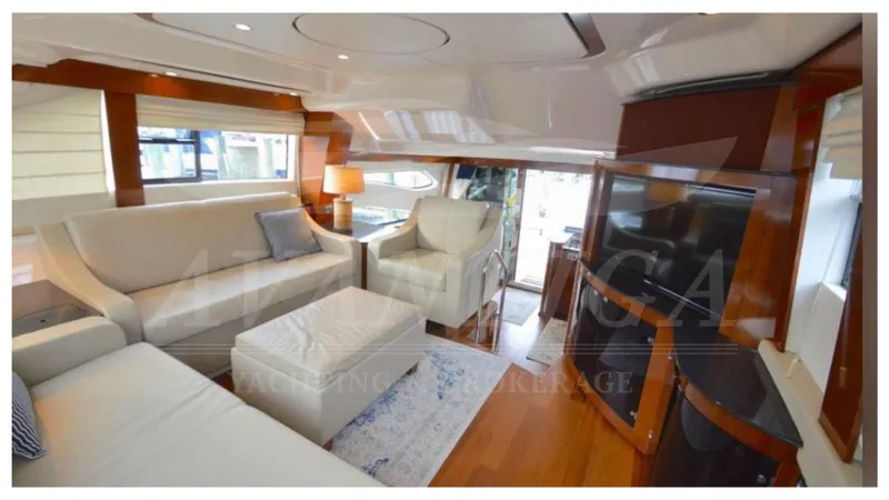  Yacht Photos Pics Luxurious interior of 2010 Meridian 541 Sedan yacht with elegant seating and modern amenities.