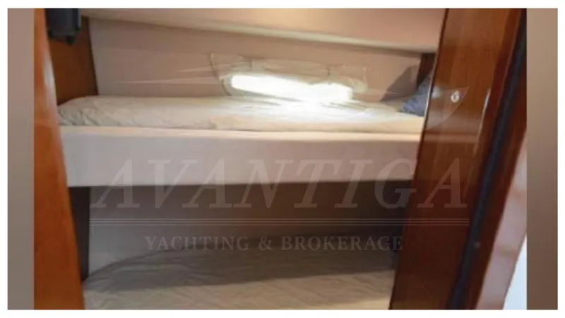  Yacht Photos Pics Interior of 2010 Meridian 541 Sedan yacht with bunk beds.