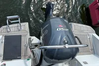 2022 Finnmaster T7 boat with Yamaha 250 outboard motor, docked on water.