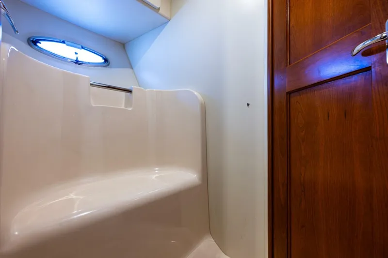 Bumber Shoot Yacht Photos Pics Interior of 2006 Silverton 42 Convertible yacht, featuring a sleek bathroom design.