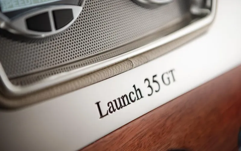  Yacht Photos Pics 2024 Chris-Craft Launch 35 GT dashboard detail with elegant design elements.