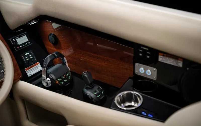  Yacht Photos Pics 2024 Chris-Craft Launch 35 GT dashboard with controls and wood paneling.