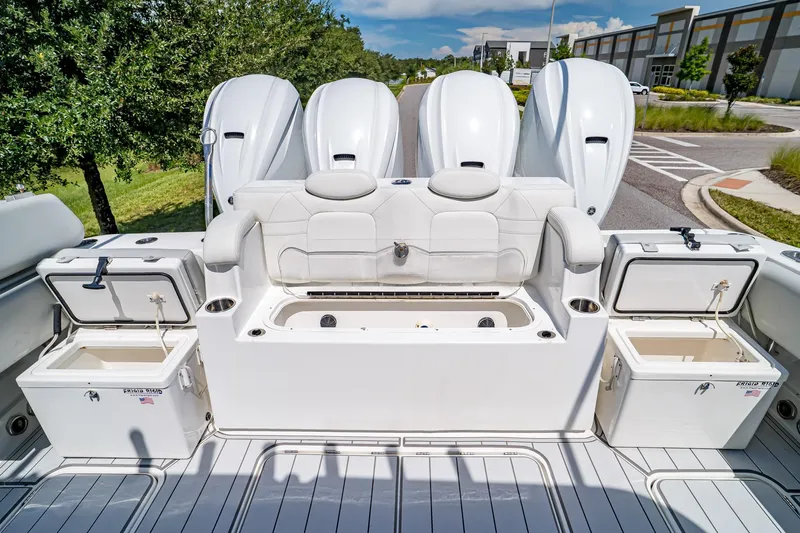  Yacht Photos Pics 2021 HCB Lujo boat with multiple outboard engines and open storage compartments.